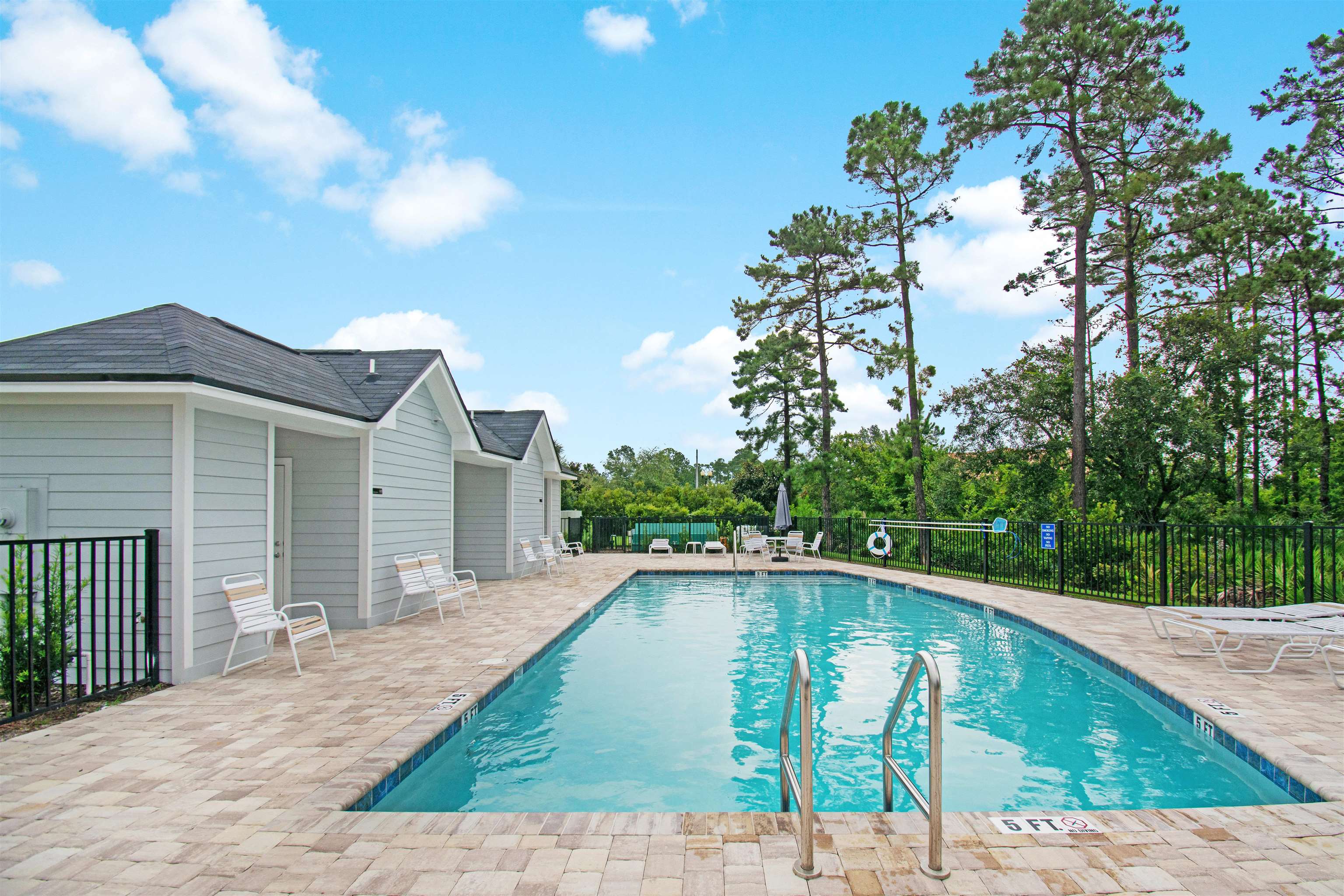 22 Ridge Lake Road St. Augustine, FL 32086 - Photo 28 of 31 Community pool featuring a patio area