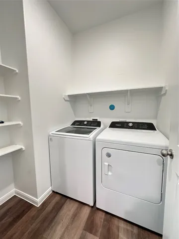 a utility room with dryer and washer