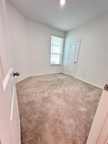 a view of empty room with window