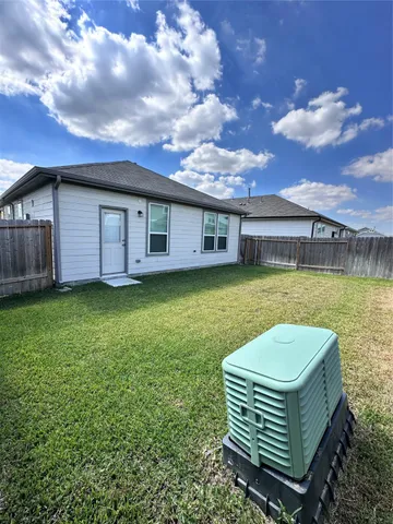 a view of a house with a garden