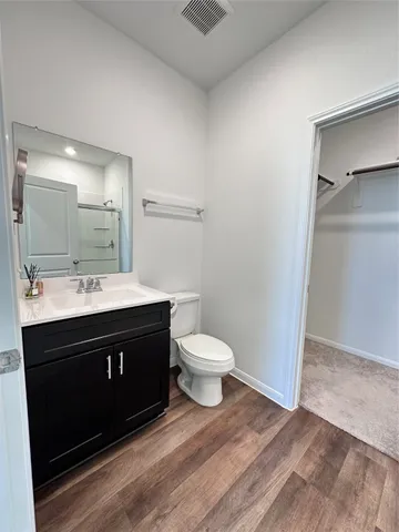 a bathroom with a sink and a toilet