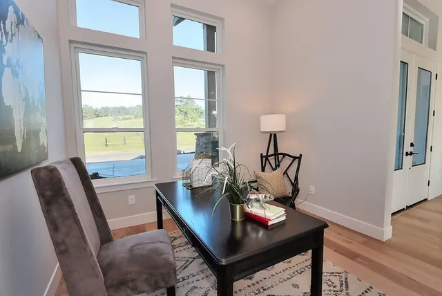 a view of house with outdoor space and swimming pool