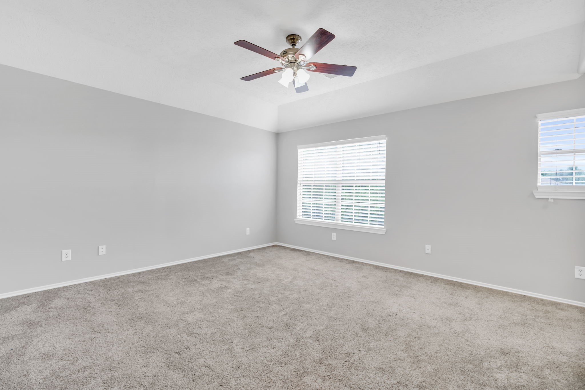 7215 Cool Spring Court Magnolia, TX 77354 - Photo 13 of 23 an empty room with ceiling fan and window