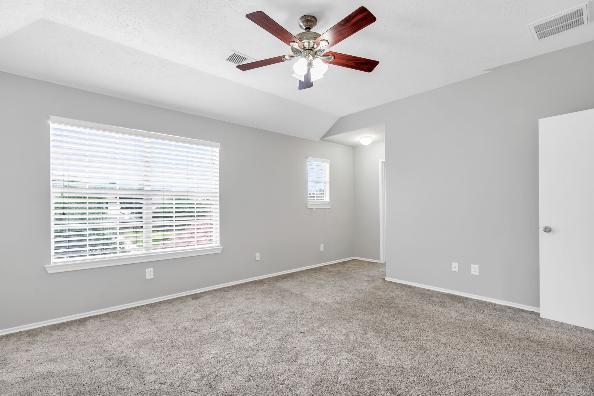 7215 Cool Spring Court Magnolia, TX 77354 - Photo 14 of 23 a view of an empty room with a window
