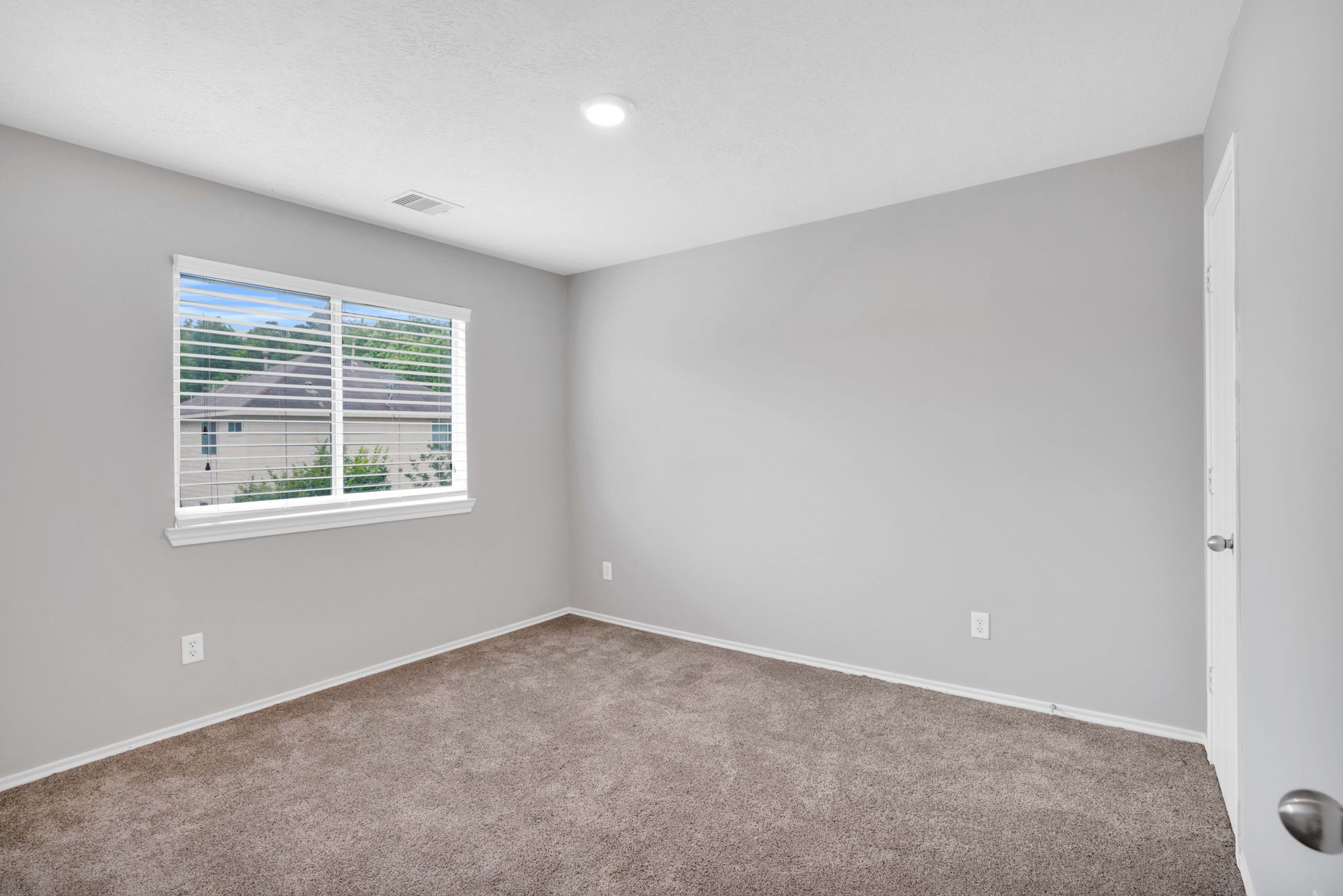 7215 Cool Spring Court Magnolia, TX 77354 - Photo 20 of 23 an empty room with a window