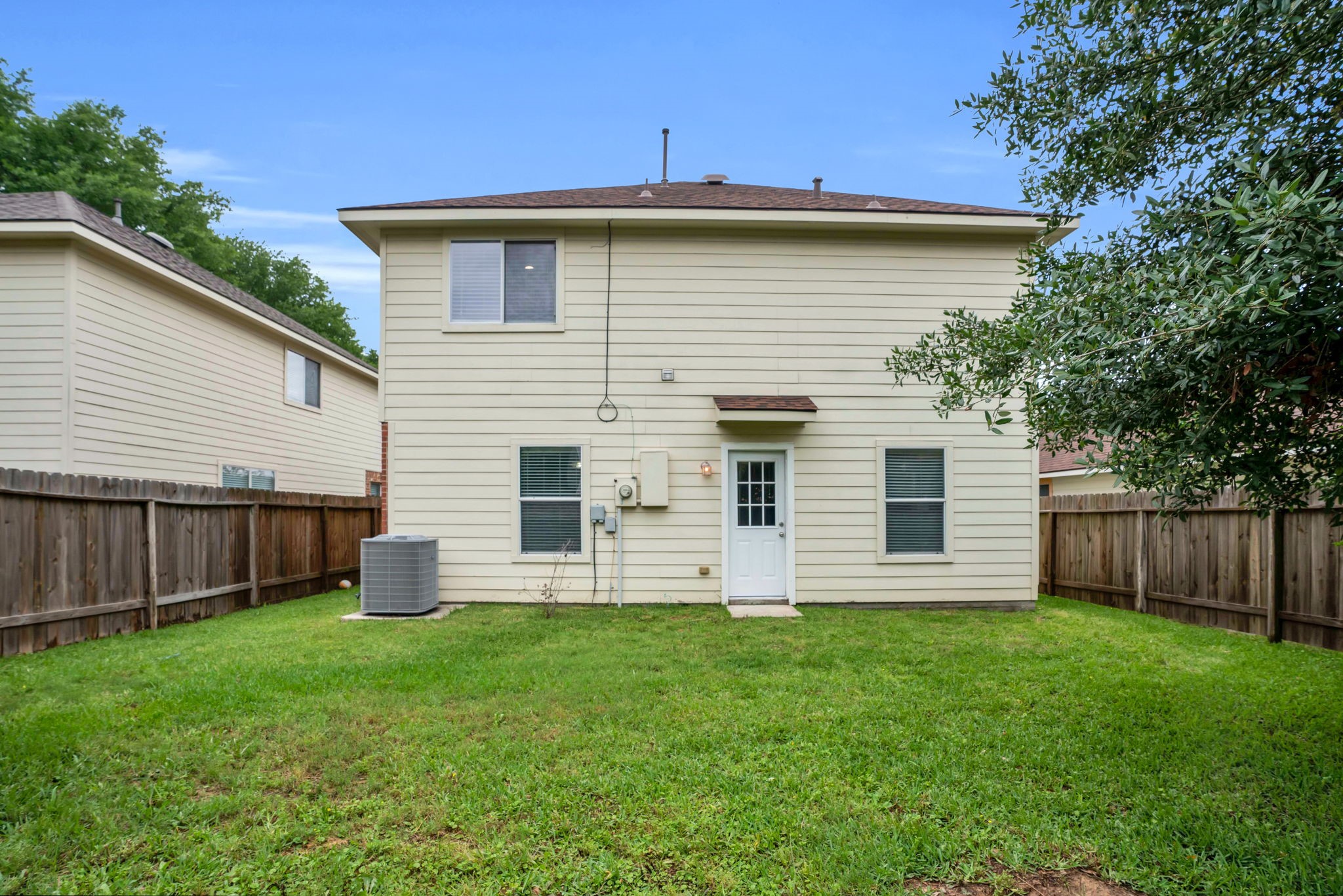 7215 Cool Spring Court Magnolia, TX 77354 - Photo 23 of 23 a front view of a house with a yard