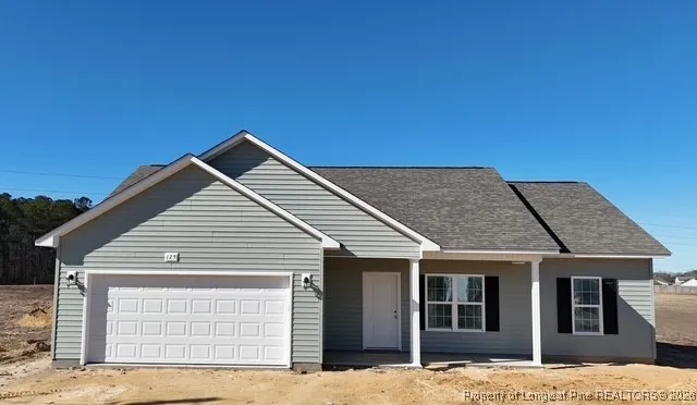 a house with trees in the background