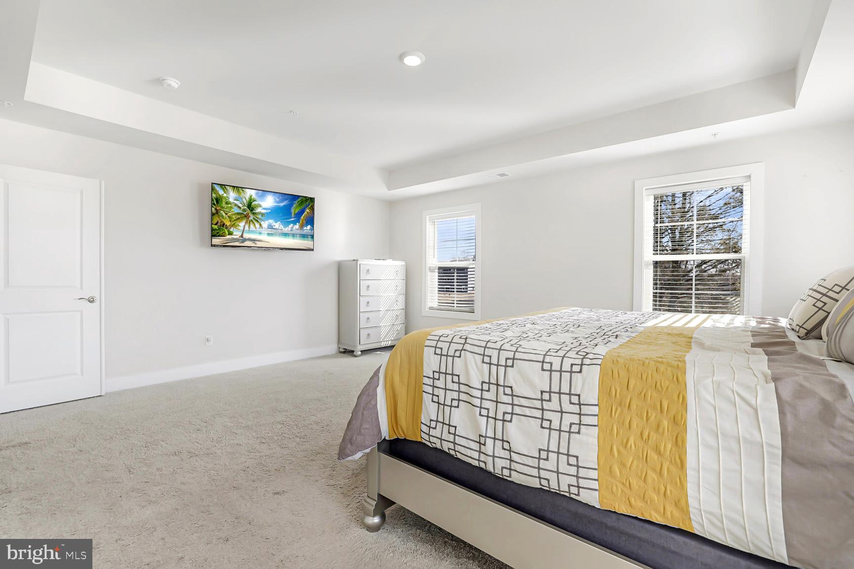 23420 Woodfield Road Gaithersburg, MD 20882 - Photo 18 of 50 a bedroom with a bed and a window