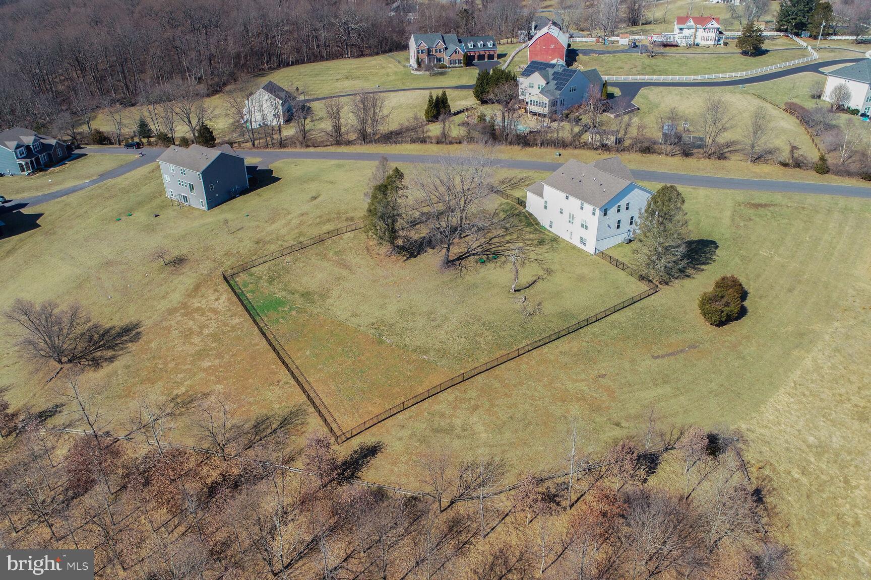 23420 Woodfield Road Gaithersburg, MD 20882 - Photo 40 of 50 a bath tub sitting next to a white bed