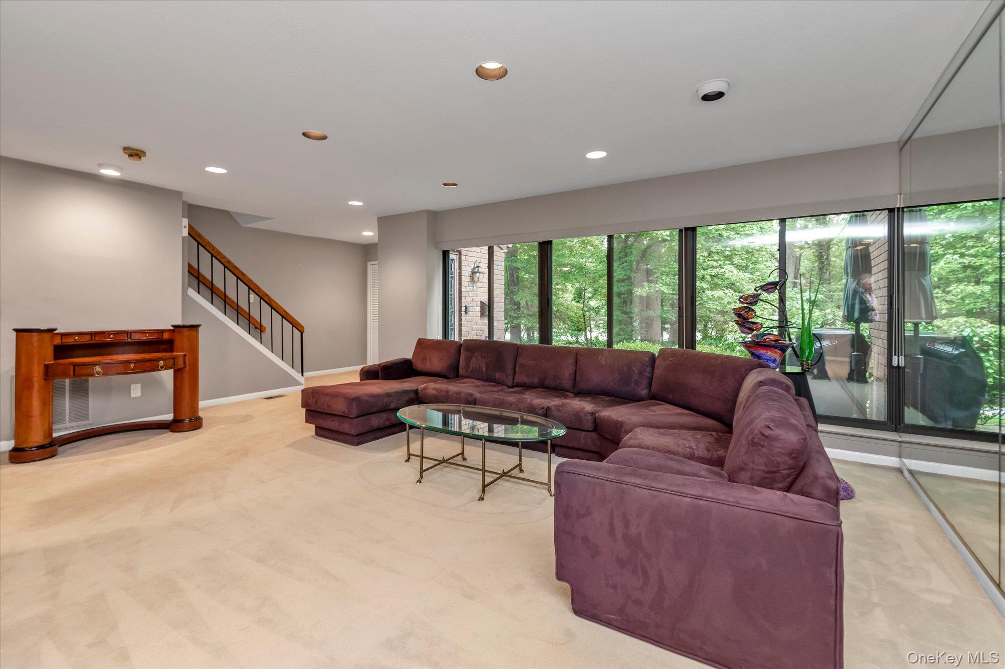 41 Spring Hollow Road Roslyn, NY 11576 - Photo 4 of 27 a living room with furniture and a large window