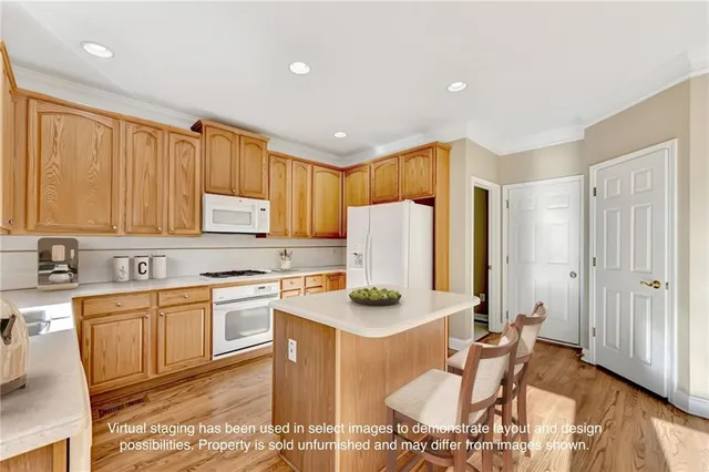 a bedroom with a large bed and a large window