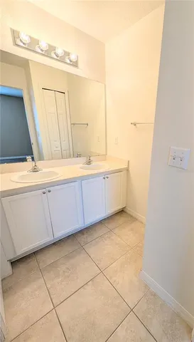a view of a kitchen with cabinets
