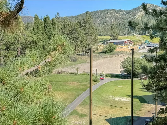 a view of a garden from a balcony