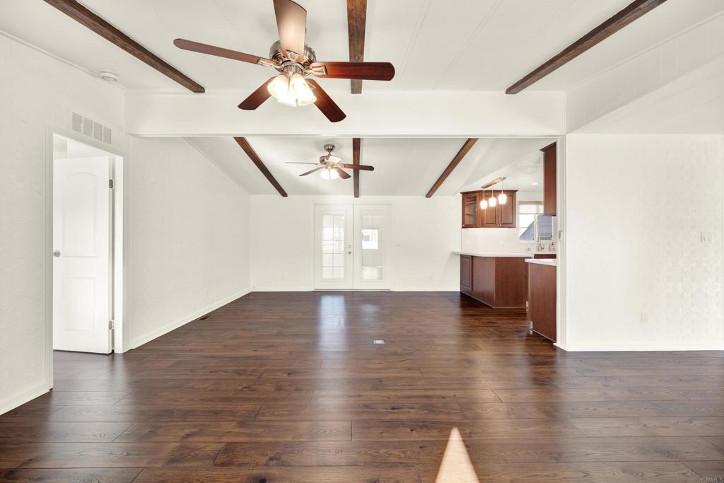 9255 North Magnolia Avenue, Unit SPC 158 Santee, CA 92071 - Photo 15 of 49 a view of empty room with wooden floor and ceiling fan