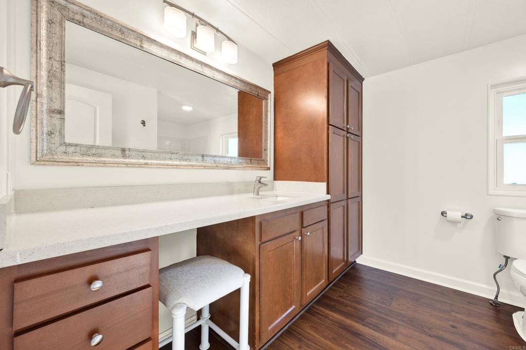 9255 North Magnolia Avenue, Unit SPC 158 Santee, CA 92071 - Photo 25 of 49 a bathroom with a sink and a mirror