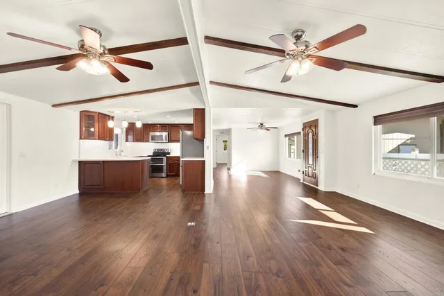 a view interior of a house wooden floor and an entryway