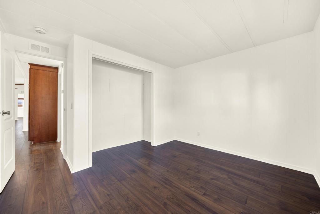 9255 North Magnolia Avenue, Unit SPC 158 Santee, CA 92071 - Photo 37 of 49 a view of a room with wooden floor