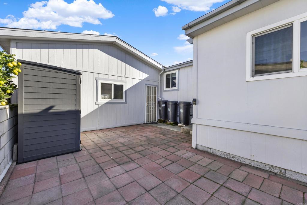 9255 North Magnolia Avenue, Unit SPC 158 Santee, CA 92071 - Photo 48 of 49 a view of backyard of house