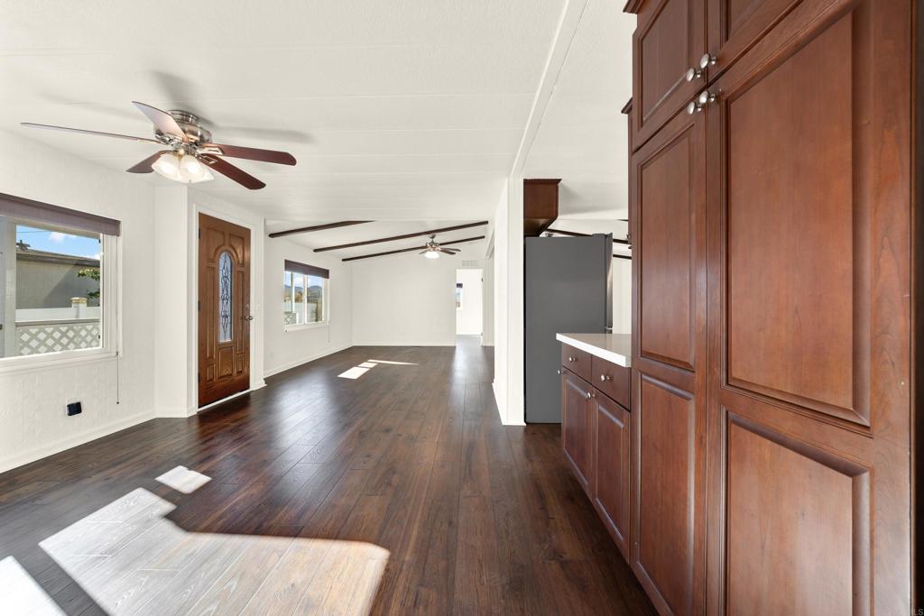 9255 North Magnolia Avenue, Unit SPC 158 Santee, CA 92071 - Photo 10 of 49 a view of a hallway view with wooden floor and staircase