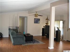 8052 Palm Tree Church Road Vale, NC 28168 - Photo 3 of 10 a living room with furniture and a hallway
