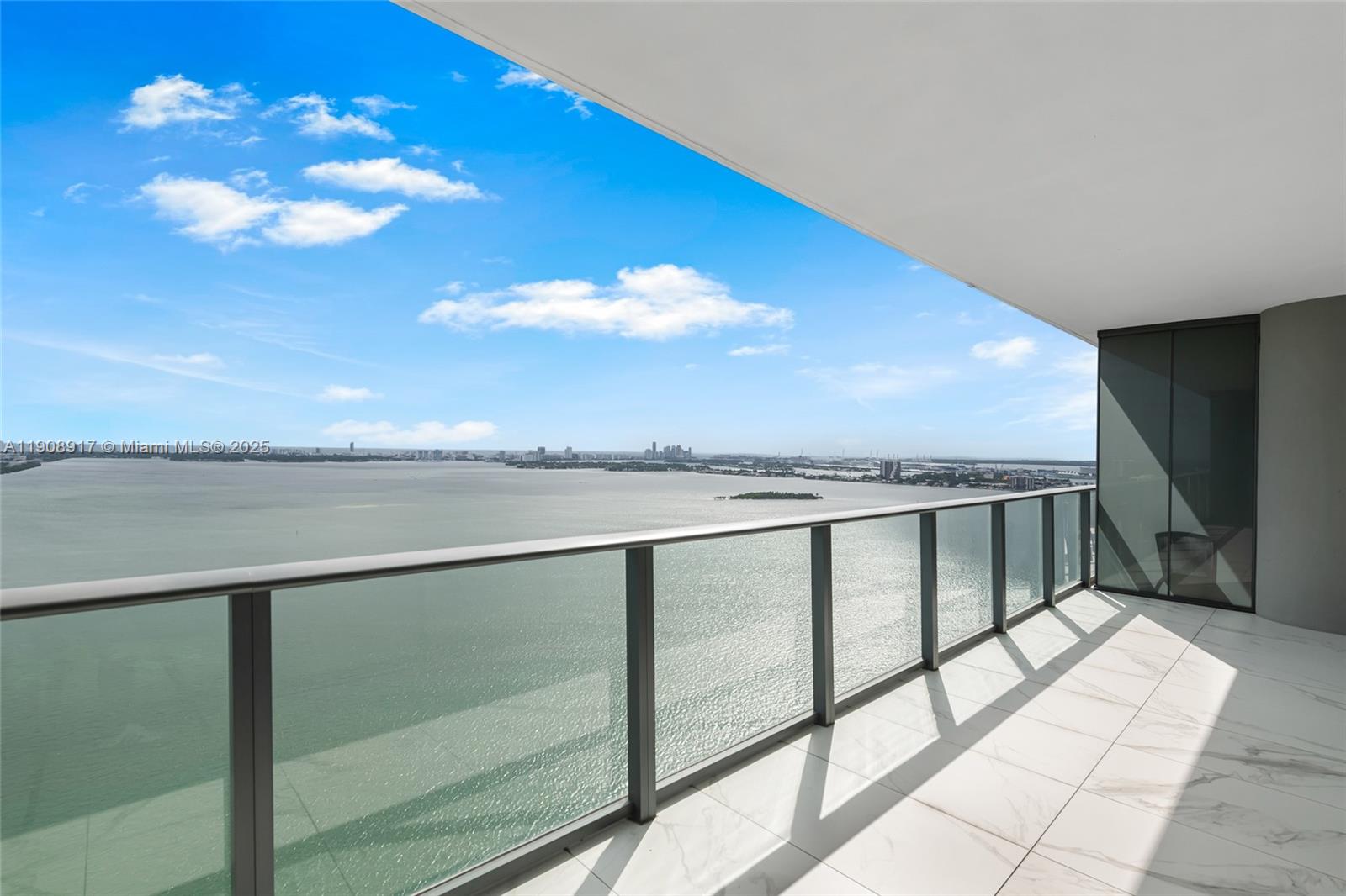 a view of balcony with furniture