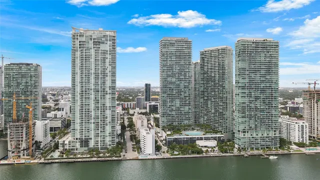 a view of city with tall buildings