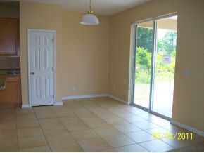 1165 Southeast Rabbit Palm Bay, FL 32909 - Photo 7 of 9 a view of an empty room with a window