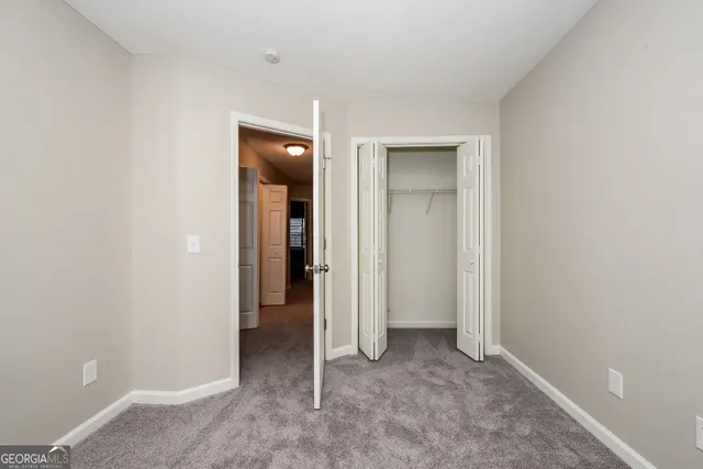 an empty room with closet