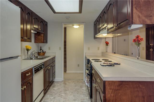 4001 Anderson Road, Unit P98 Nashville, TN 37217 - Photo 10 of 20 This11x9 Kitchen is the center point of the home! Very functional kitchen! Love that it opens up to bar and den/ dining areas....making it feel much larger. ALL appliances WILL remain!!!