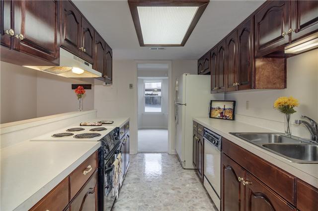 4001 Anderson Road, Unit P98 Nashville, TN 37217 - Photo 11 of 20 2nd view ~ lots of lighting & NO shortage of counter tops or cabinets!!! In addition, there is an extra large bulit-in wall pantry and utility room.