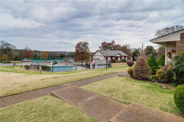 4001 Anderson Road, Unit P98 Nashville, TN 37217 - Photo 4 of 20 Ahh, the view from your front door ~ Overlooks POOL, LAKE, Club House & Tennis Courts!!! Note: The club house has an excercise area and saunas too!!!