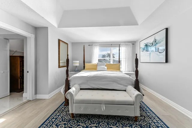 a bathroom with a double vanity sink mirror double and bathtub