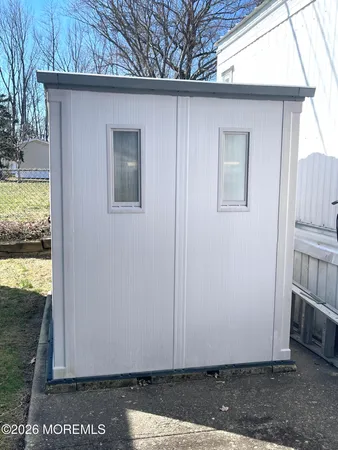 a view of backyard with hardwood