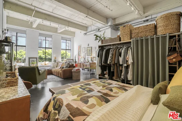 a bed room with a bed and a couch