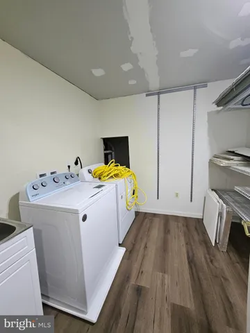 a utility room with washer and dryer