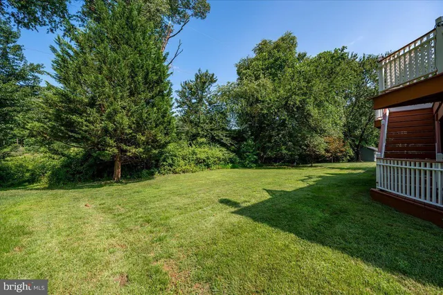 a view of a backyard with a garden