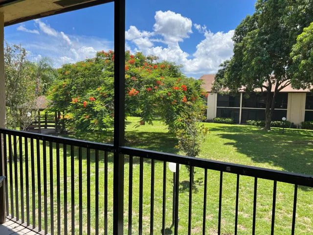 a view of a porch with a yard