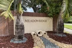 a view of entryway with flower pots