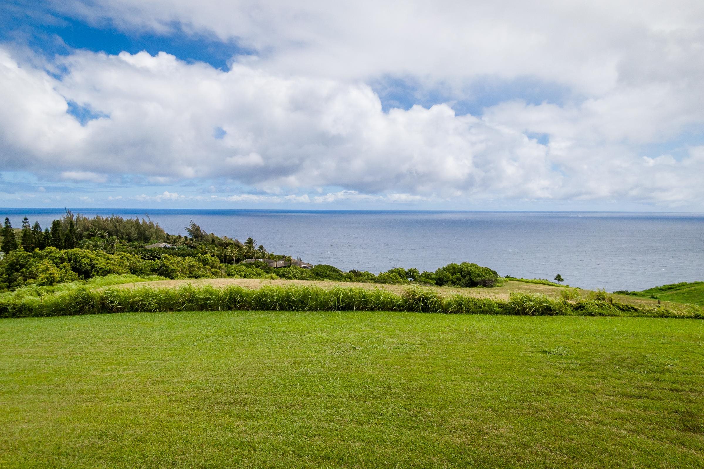 300 Mehana Road, Unit A Haiku, HI 96708 - Photo 11 of 21 a view of an ocean and trees