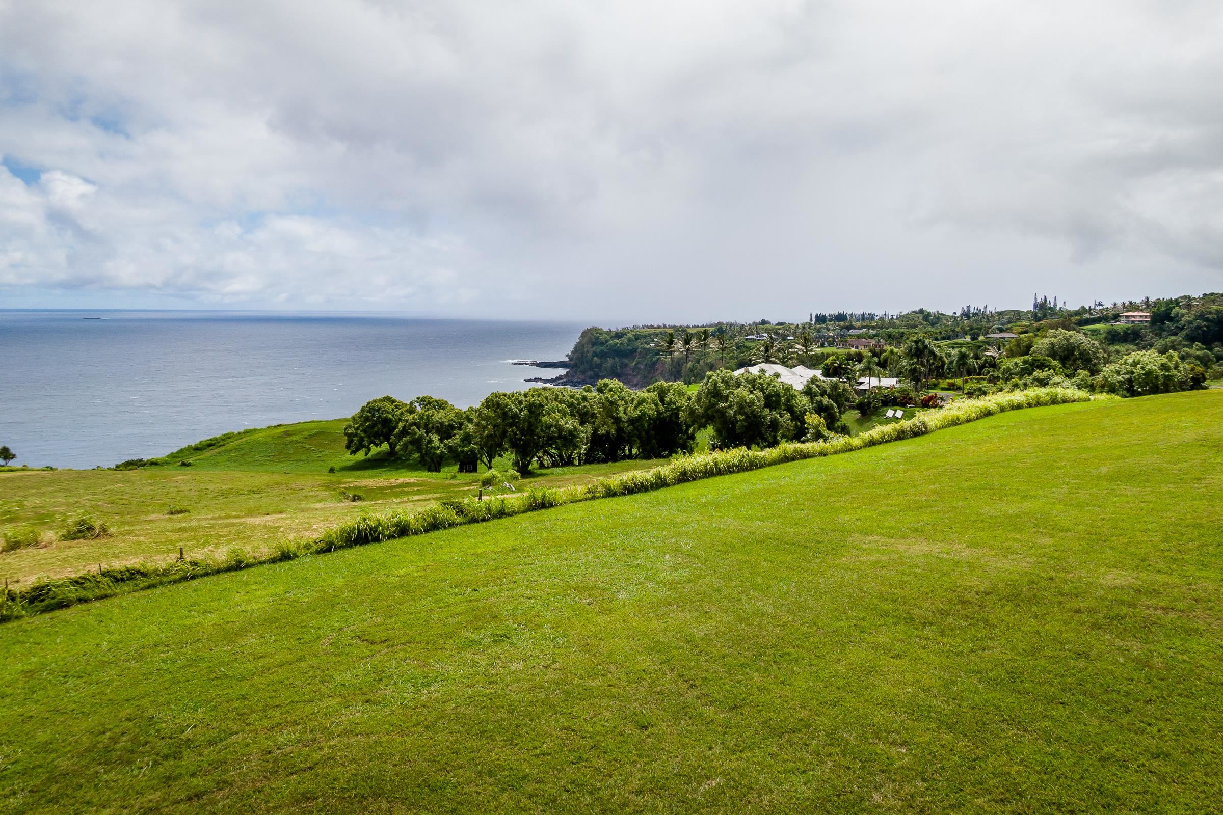 300 Mehana Road, Unit A Haiku, HI 96708 - Photo 12 of 21 a view of an ocean and beach
