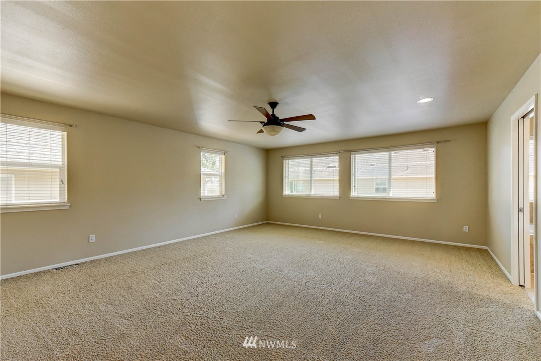 1716 235th Place Southwest Bothell, WA 98021 - Photo 14 of 25 a view of an empty room with a window