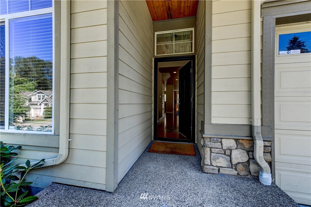 1716 235th Place Southwest Bothell, WA 98021 - Photo 3 of 25 a view of a door and chair in the room