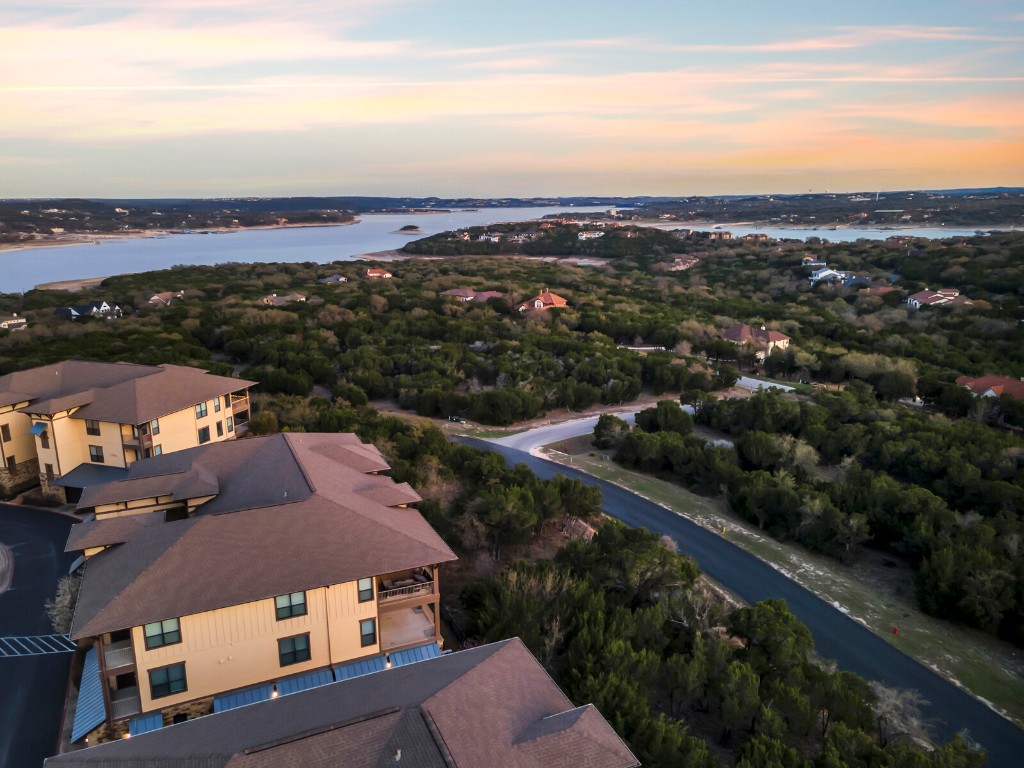 17808 Maritime Point, Unit 301 Jonestown, TX 78645 - Photo 33 of 40 an aerial view of residential houses with outdoor space and street view