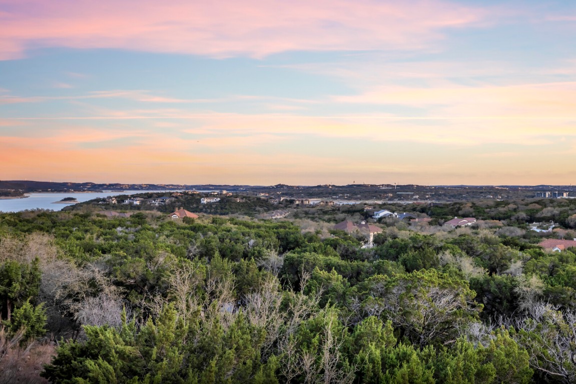 17808 Maritime Point, Unit 301 Jonestown, TX 78645 - Photo 35 of 40 a view of a city with lush green forest