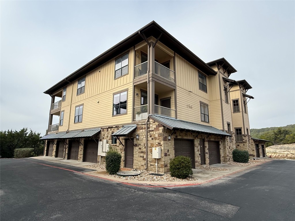 17808 Maritime Point, Unit 301 Jonestown, TX 78645 - Photo 40 of 40 View of apartment building / complex with a garage