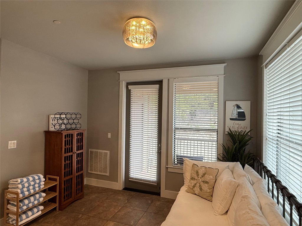 17808 Maritime Point, Unit 301 Jonestown, TX 78645 - Photo 6 of 40 a bedroom with a bed and a window