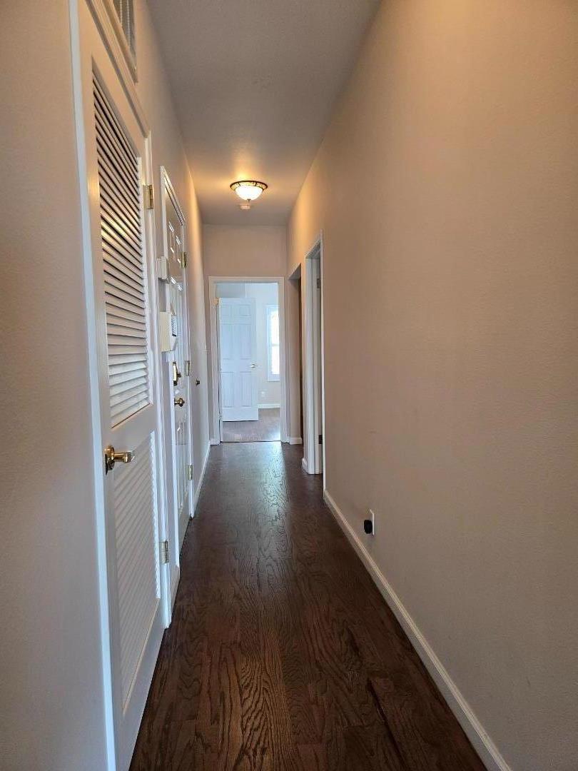 551 Merritt Avenue, Unit 1 Oakland, CA 94610 - Photo 14 of 20 a view of hallway with wooden floor