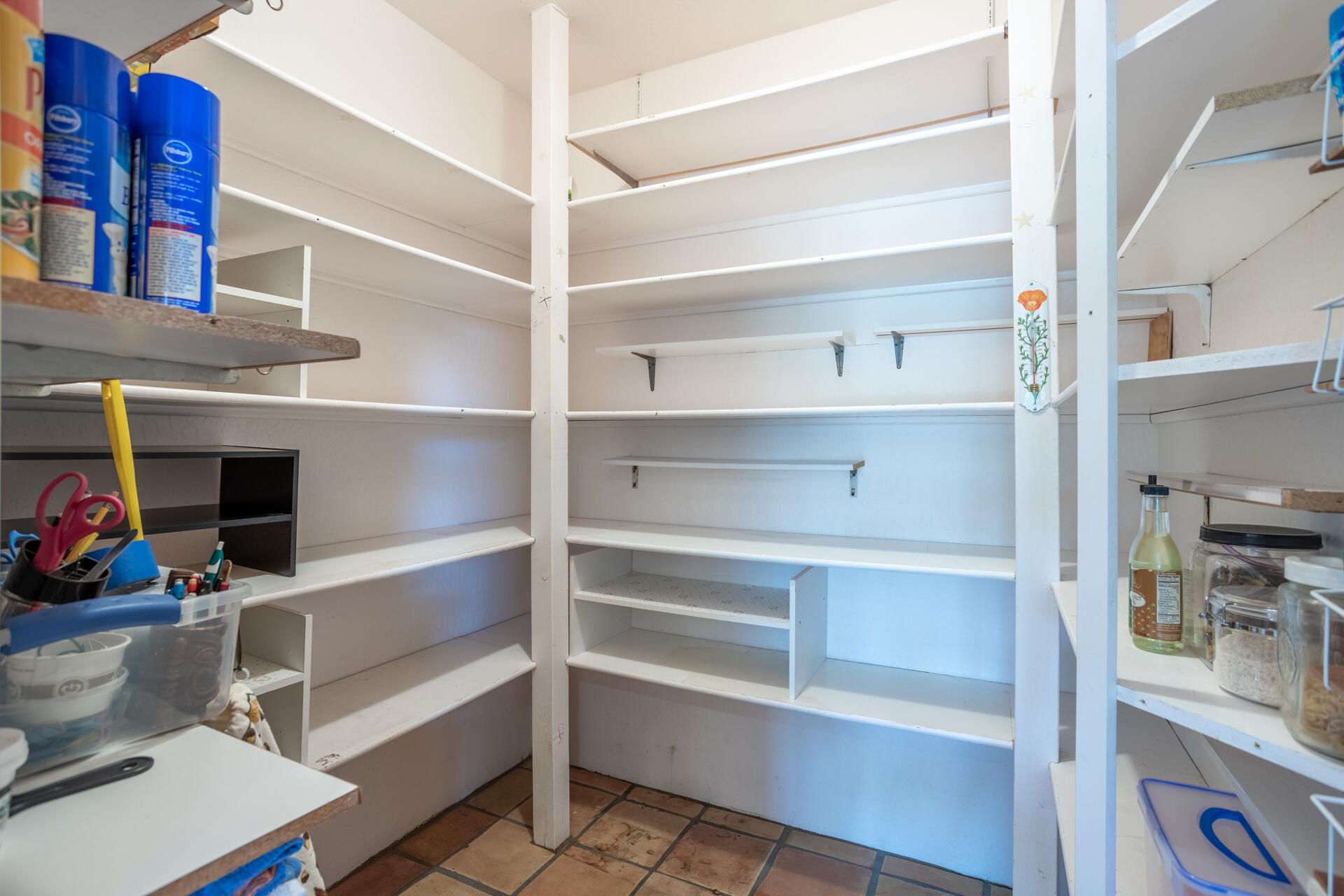 15560 China Rapids Drive Red Bluff, CA 96080 - Photo 24 of 43 a view of walk in closet with clothes and shoes