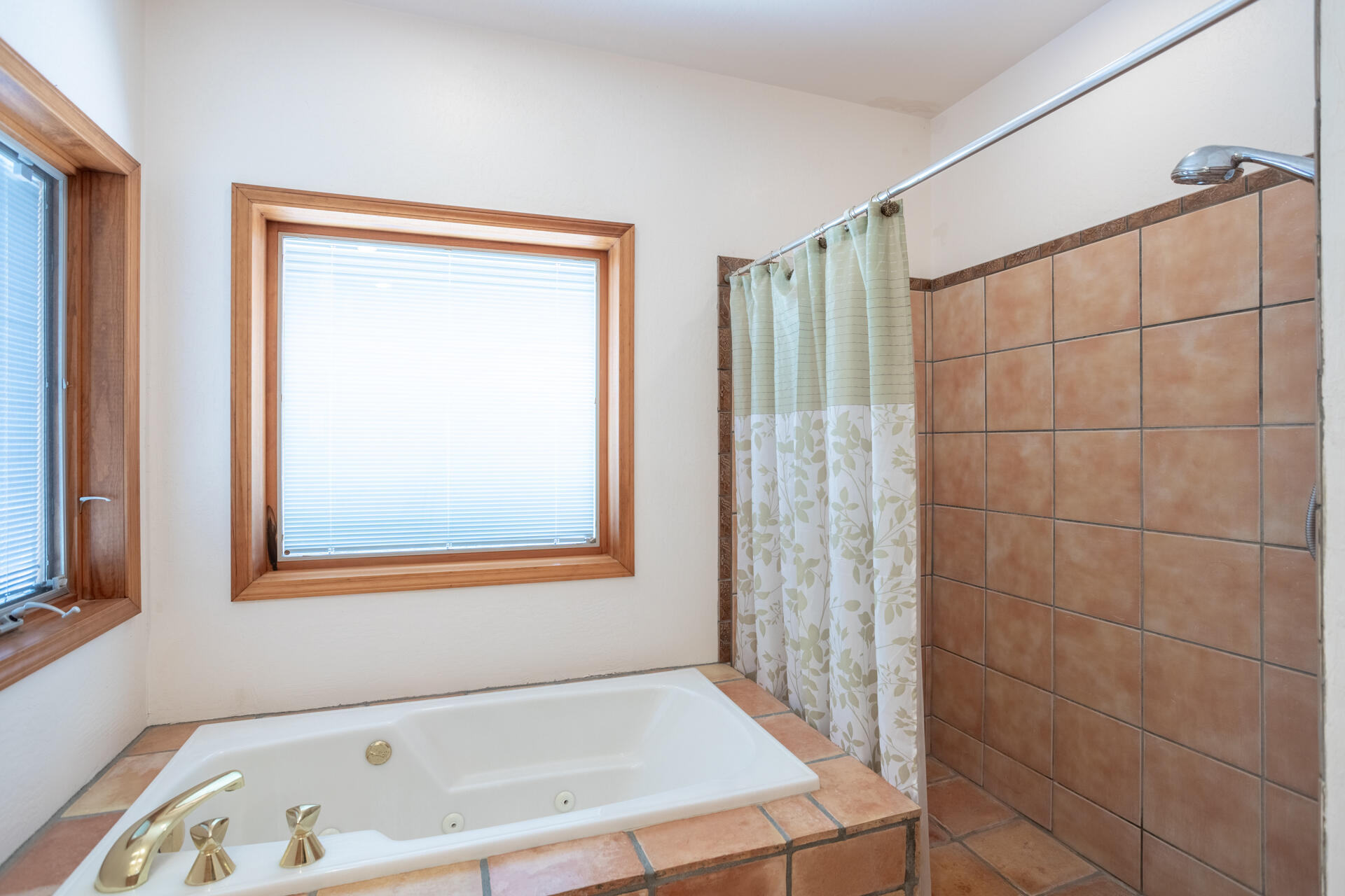 15560 China Rapids Drive Red Bluff, CA 96080 - Photo 33 of 43 a bathroom with a bathtub and a shower
