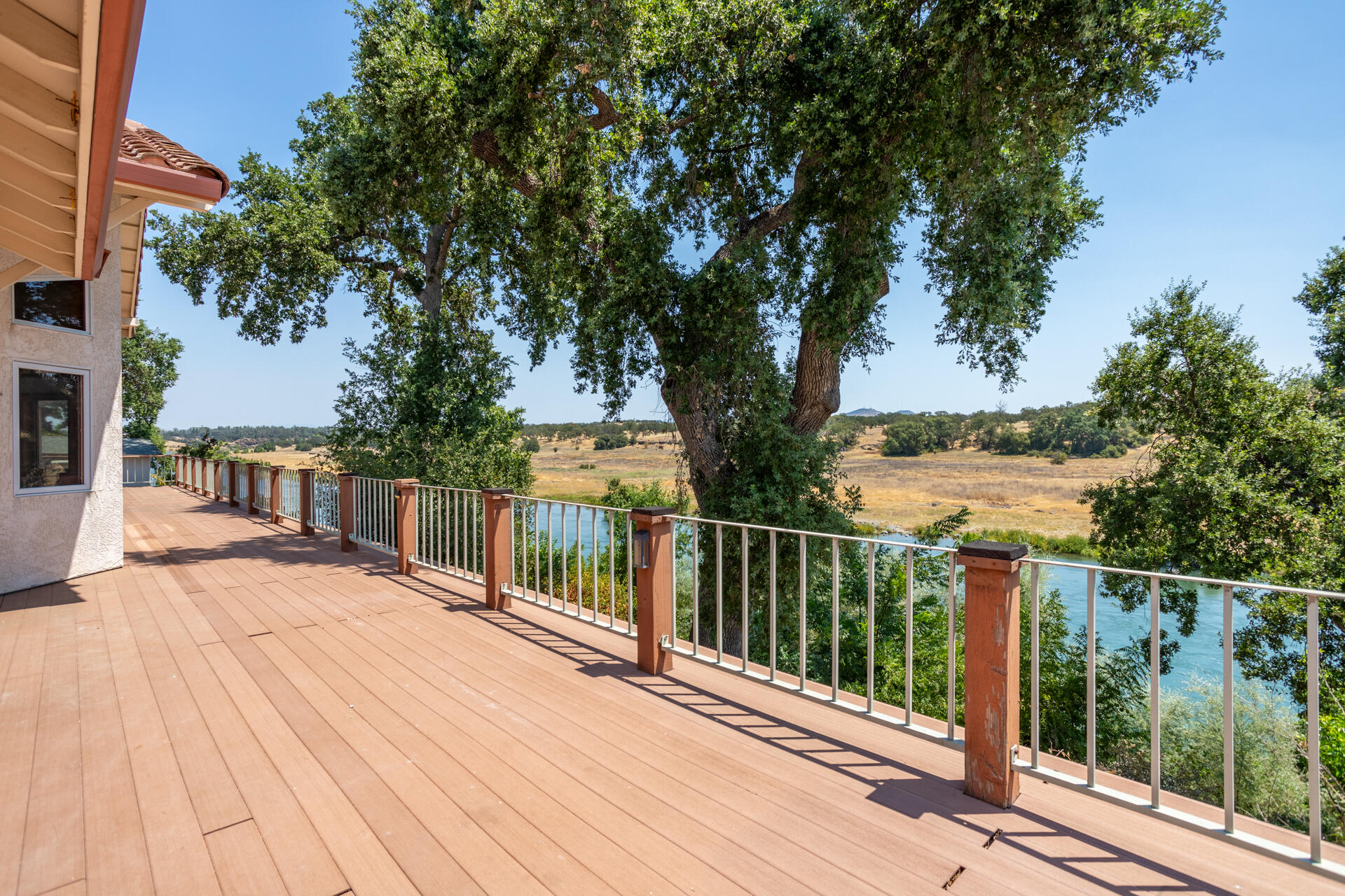 15560 China Rapids Drive Red Bluff, CA 96080 - Photo 38 of 43 a view of balcony with wooden floor and fence